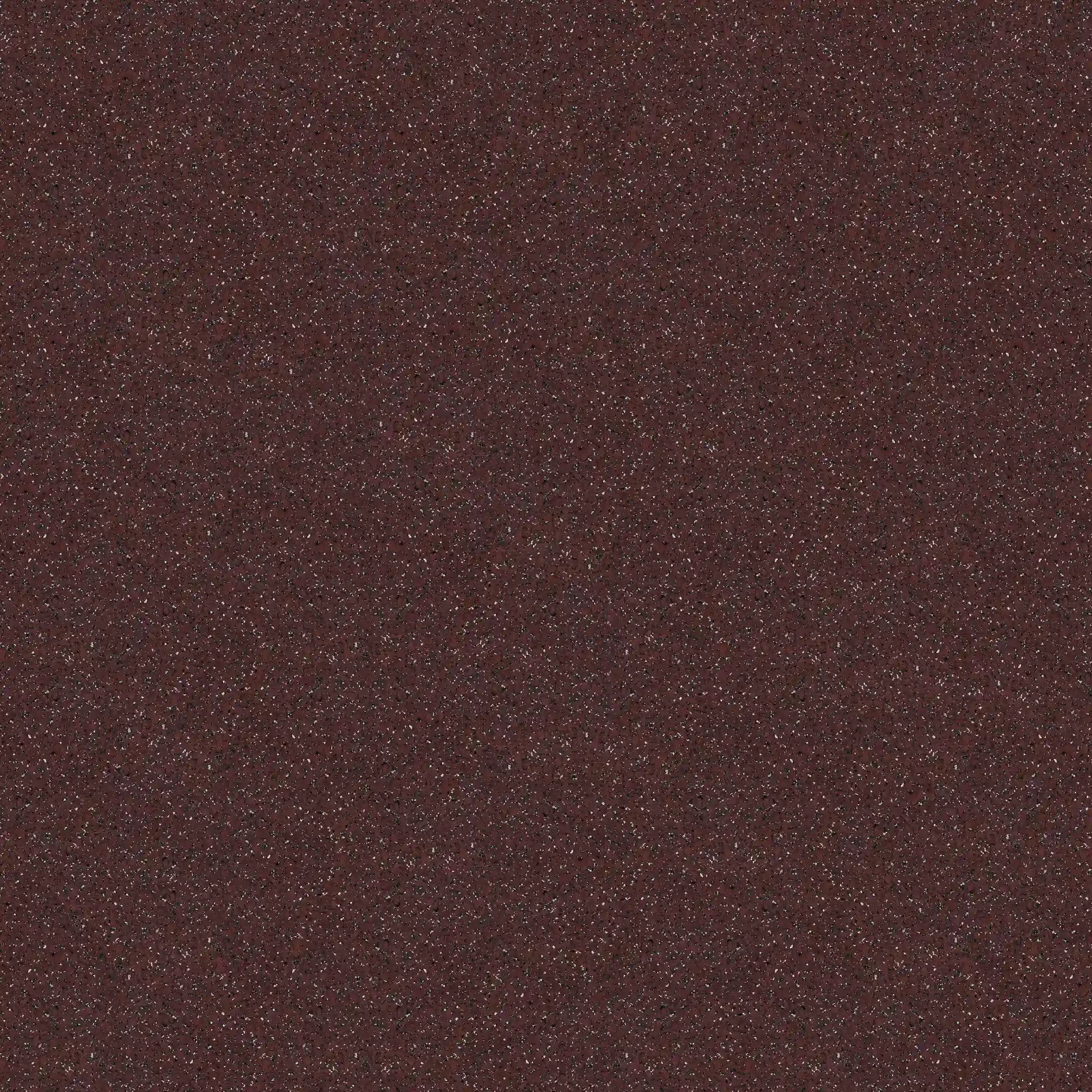 A close-up of ECORE Performance Motivate Plus Rubber Roll - 10.5mm Flooring by ECORE Athletic shows a textured, dark brown surface with multicolored speckles, creating a granular and subtly shimmering look.