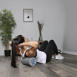 Woman rolling back on open cell foam short foam roller by CanDo