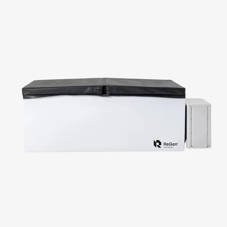A rectangular cold plunge with a white exterior and a black foldable foam cover on top and a white external chiller unit on the right side of the plunge