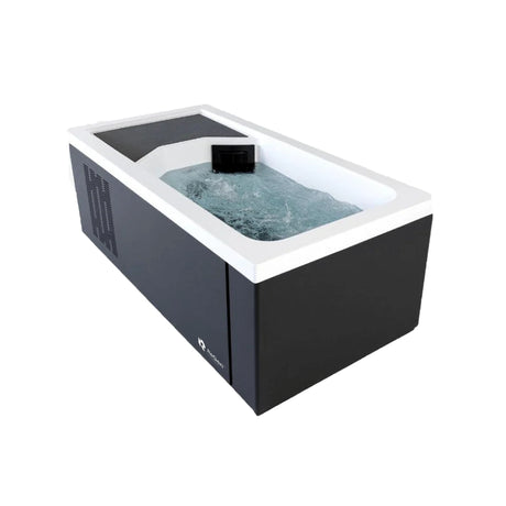 A rectangular cold plunge filled with water with a black exterior and white acrylic interior 
