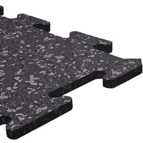 Close-up of an ECORE Athletic ECORE Rubber Floor Tiles - 8mm Interlocking tile, featuring black speckles and puzzle-like edges for seamless connection with other tiles.