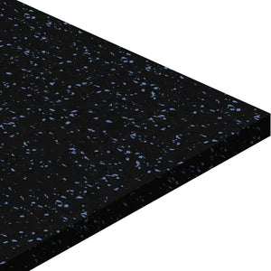 A close-up of the ECORE Basic Fit Rubber Roll - 9mm Flooring by ECORE Athletic shows its black surface with blue speckles, viewed at an angle against a white background. Thick and durable, this mat is ideal for flooring or protective surfacing.