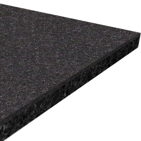 A close-up view of the ECORE Performance Motivate Plus Rubber Roll - 10.5mm Flooring by ECORE Athletic, featuring a rectangular black rubber mat with a textured surface and straight edges, displayed at an angle against a white background.