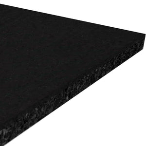 A close-up of the ECORE Performance Motivate Plus Rubber Roll - 10.5mm Flooring by ECORE Athletic shows its rectangular, black, textured rubber surface displayed at an angle against a white background.