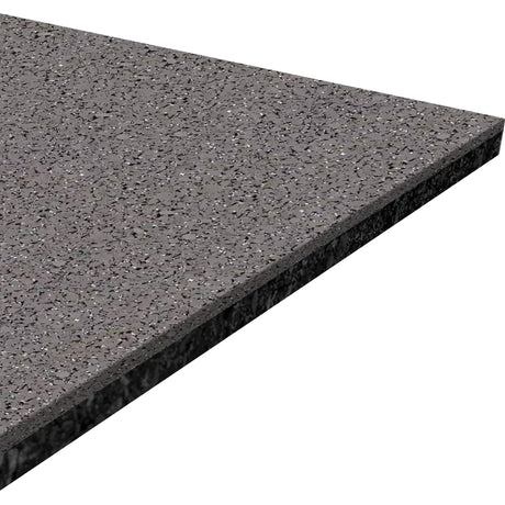 A close-up of the ECORE Performance Beast Rubber Roll - 10.5mm Flooring by ECORE Athletic shows its rectangular, speckled gray surface with a smooth, polished finish and slightly beveled edge against a white background.