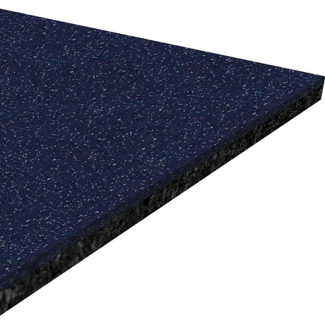 A close-up of the ECORE Athletic Performance Beast Rubber Roll 10.5mm Flooring shows its rectangular, dark blue speckled surface with a black underside, displayed at an angle against a white background.