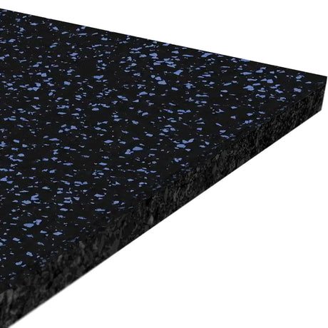 A close-up, angled view of the ECORE Athletic Performance Beast Plus Rubber Roll - 14.5mm Flooring shows its rectangular shape and black surface with small blue specks.