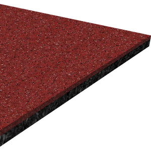 A close-up view of the ECORE Athletic Performance Beast Rubber Roll - 10.5mm Flooring shows its square, speckled red and black textured surface with a layered edge highlighting the thickness of the material.