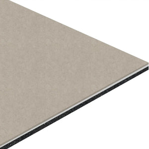 A close-up of the corner of an ECORE Bounce 2 Motivate Laminate Roll - 7mm Class 1 Flooring panel by ECORE Athletic, showing its multi-layered structure with a light beige top surface and black inner layer.