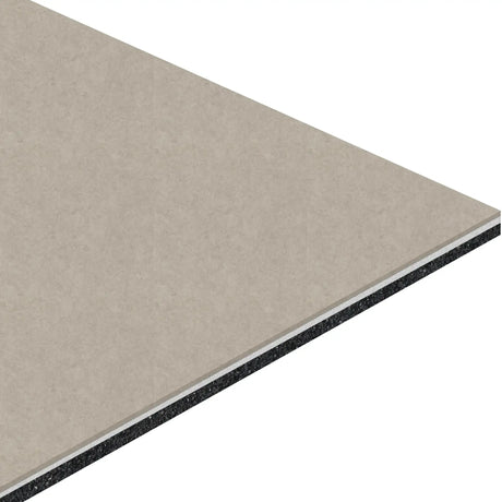 A close-up of the corner of an ECORE Bounce 2 Motivate Laminate Roll - 7mm Class 1 Flooring panel by ECORE Athletic, showing its multi-layered structure with a light beige top surface and black inner layer.