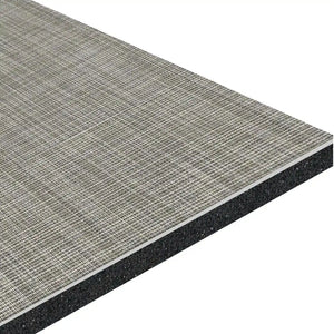 A close-up of the ECORE Ebb & Flow Motivate Laminate Roll - 6mm Class 1 Flooring by ECORE Athletic, featuring a rectangular sheet with a textured, grid-patterned surface and a solid dark base layer underneath.
