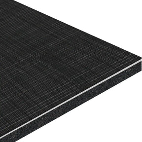 A close-up of the ECORE Ebb & Flow Motivate Laminate Roll - 6mm Class 1 Flooring by ECORE Athletic shows its dark, rectangular board with a textured grid surface and visible layered core at the edge.
