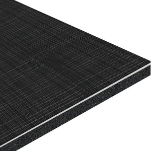 A close-up of the ECORE Ebb & Flow Motivate Laminate Roll - 6mm Class 1 Flooring by ECORE Athletic shows its dark, rectangular board with a textured grid surface and visible layered core at the edge.