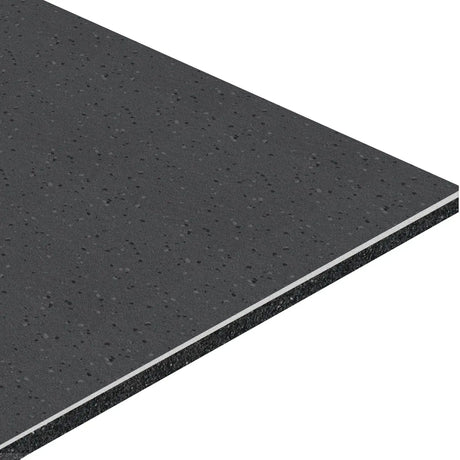 A close-up of the ECORE HydroGrip Motivate Laminate Roll - 7mm Class 1 Flooring by ECORE Athletic shows its rectangular, dark gray, speckled foam texture and layered construction at an angle on a white background.
