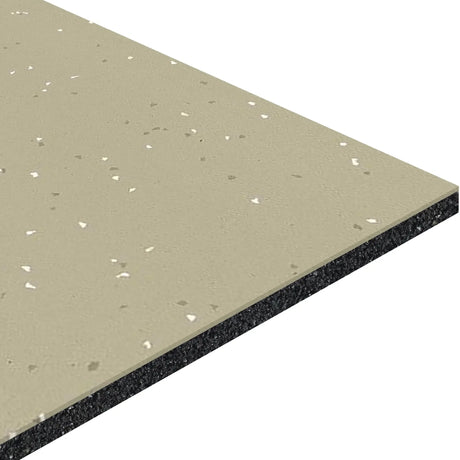 A close-up of the ECORE Integrity Motivate Laminate Roll - 7mm Class 1 Flooring by ECORE Athletic shows its rectangular beige surface with white speckles and black layered backing, viewed from an angle.
