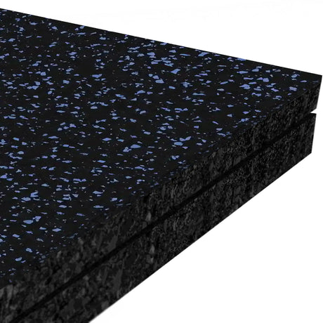 Close-up of two stacked ECORE Performance Monster Rubber Roll - 22.5mm Flooring mats by ECORE Athletic, featuring black surfaces with blue specks and textured edges.