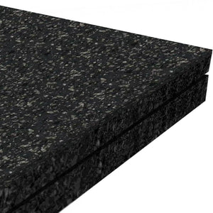 Close-up of two stacked ECORE Athletic Performance Monster Rubber Roll - 22.5mm mats with a speckled gray pattern, highlighting their thickness and textured surface on a white background.