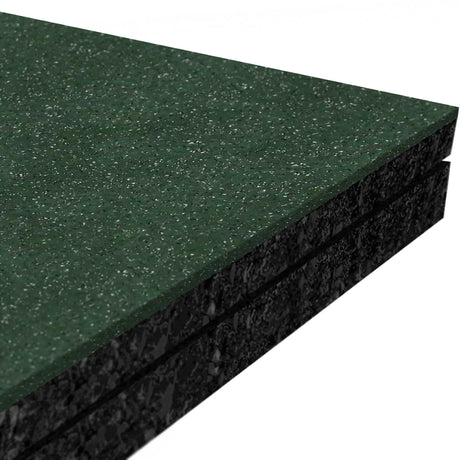 Close-up of three stacked ECORE Performance Monster Rubber Roll - 22.5mm Flooring mats by ECORE Athletic, featuring a green speckled surface and black textured edges, photographed against a white background.