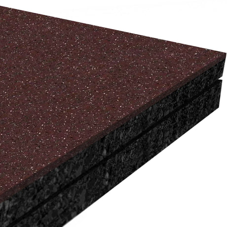 Close-up of three stacked ECORE Athletic Performance Monster Rubber Roll - 22.5mm Flooring tiles, featuring a speckled dark red top and black sides, commonly used for mats or flooring.