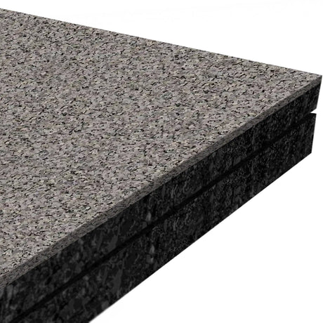 Three stacked sheets of ECORE Athletic’s ECORE Performance Monster Rubber Roll - 22.5mm flooring in speckled gray and black are shown close-up against a white background.