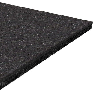 A close-up of the ECORE Performance Motivate Plus Rubber Roll - 10.5mm Flooring by ECORE Athletic, featuring a rectangular black mat with a speckled texture, photographed at an angle to showcase its thickness and surface details.