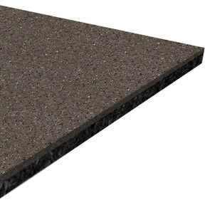A close-up of the ECORE Performance Motivate Plus Rubber Roll - 10.5mm Flooring by ECORE Athletic shows its speckled brown, textured surface and beveled edges against a white background.