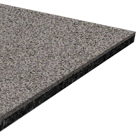 A close-up of the ECORE Performance Motivate Plus Rubber Roll - 10.5mm Flooring by ECORE Athletic, featuring a rectangular slab with a polished grey speckled pattern, displayed at an angle against a white background.