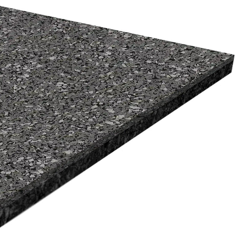A close-up of the ECORE Performance Motivate Plus Rubber Roll - 10.5mm Flooring by ECORE Athletic, showing its rectangular shape, dark gray speckled surface, and thickness from an angled view.