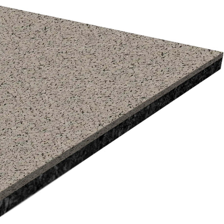 A close-up of the ECORE Athletic ECORE Performance Motivate Plus Rubber Roll - 10.5mm Flooring, a rectangular, speckled gray and black slab with a smooth surface and beveled edges, displayed on a white background.