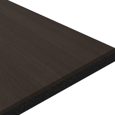 A close-up of the ECORE Athletic ECORE Moxie Motivate Laminate Roll - 10.5mm Class 1 Flooring shows its dark wood-textured surface and black core, displayed at an angle against a white background.