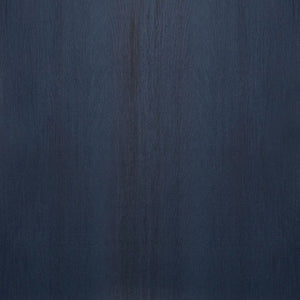 Close-up of ECORE Moxie Motivate Laminate Roll - 10.5mm Class 1 Flooring by ECORE Athletic reveals a smooth dark blue surface with subtle vertical grain patterns and natural texture variations.