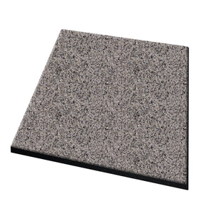 The ECORE Performance dBTile Rubber Tile – 2.5" Acoustic Flooring by ECORE Athletic is shown at an angle on a white background, featuring a rectangular shape with a speckled surface and beveled edges.