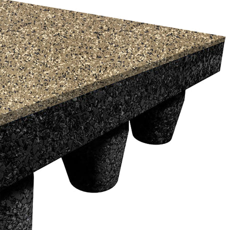 Close-up of an ECORE PlayGuard Rubber Tile (2.5" Playground Flooring) by ECORE Athletic, showing its textured, speckled corner resting on black cone-shaped supports, isolated on a white background.