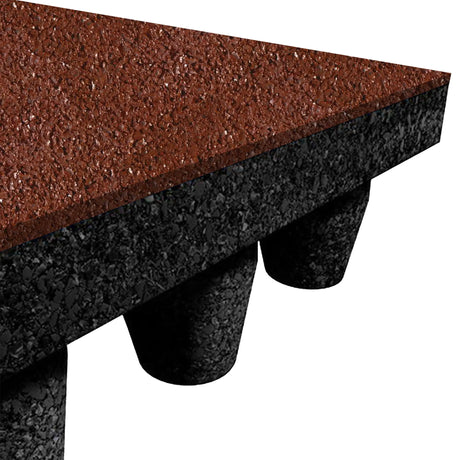 Close-up of an ECORE PlayGuard Rubber Tile - 2.5" Playground Flooring by ECORE Athletic, showing its textured red top surface and black underside with multiple cylindrical supports.