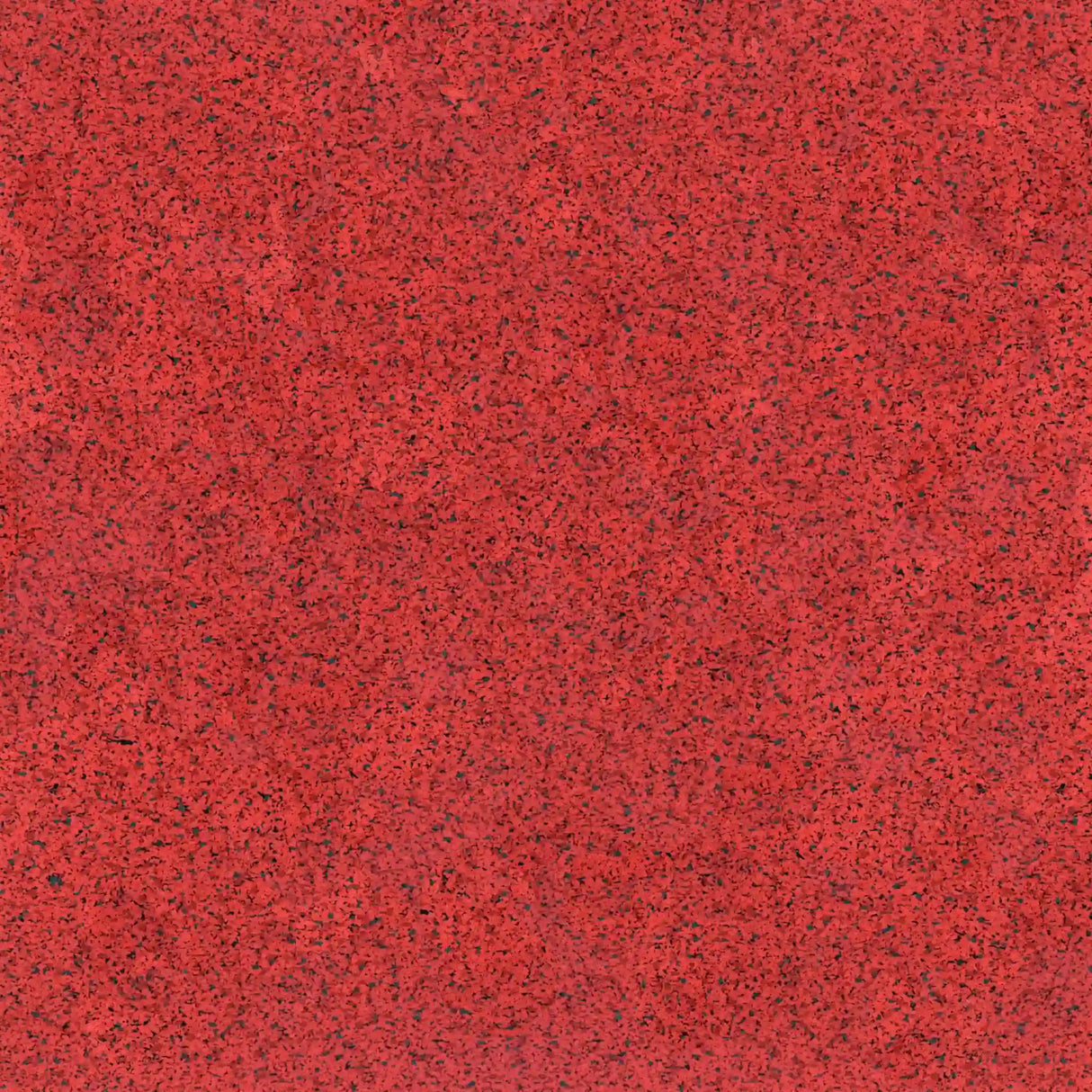 Close-up of ECORE Athletic’s PlayGuard Rubber Tile – 2.5" Playground Flooring in red, showing a speckled pattern with black and dark red flecks for a textured, natural stone look.