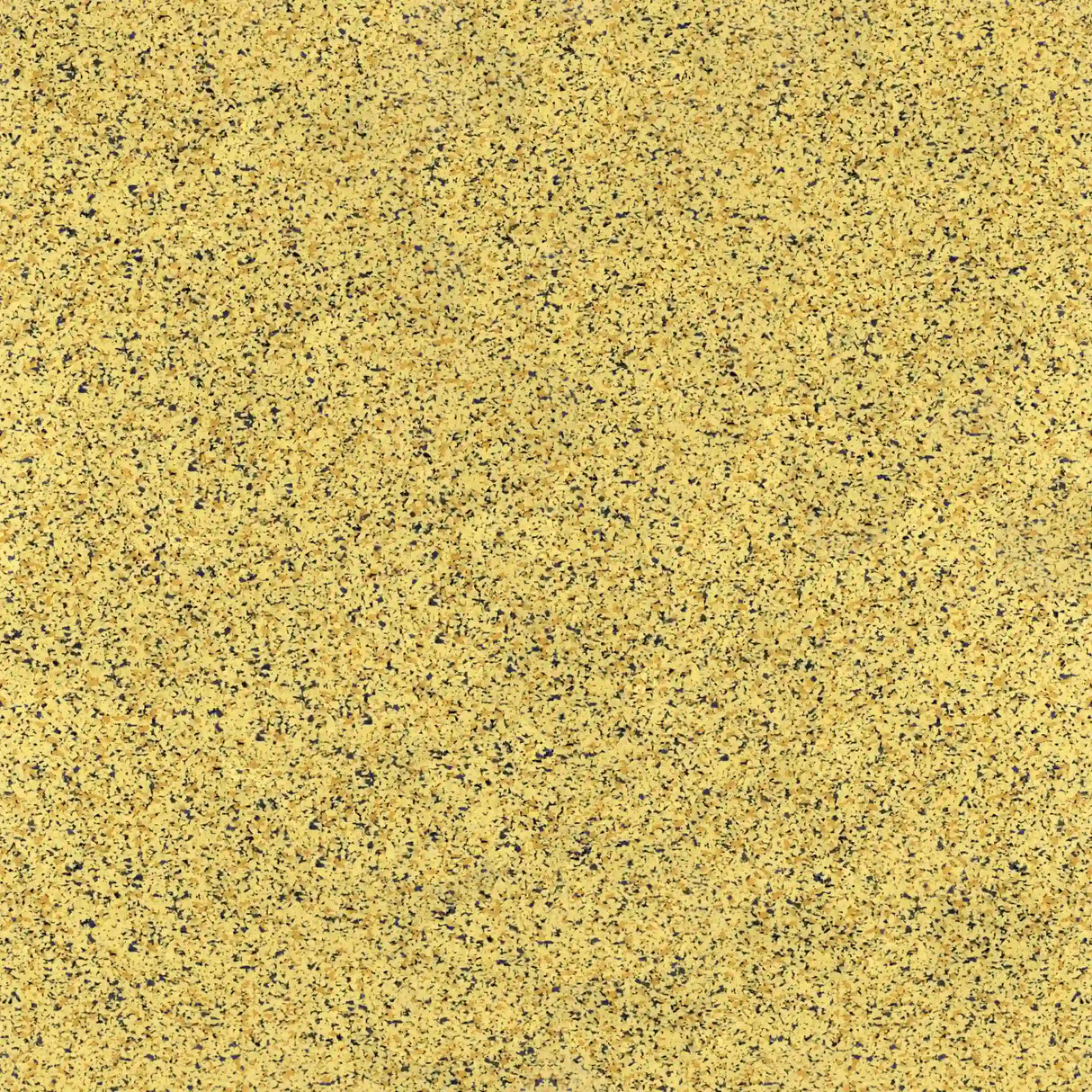 Close-up of ECORE Athletic's PlayGuard Rubber Tile - 2.5" Playground Flooring, featuring a yellowish surface with evenly distributed small black, brown, and gray flecks resembling granite or terrazzo.