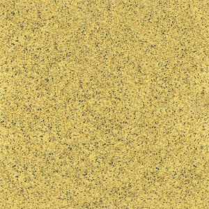 Close-up of ECORE Athletic's PlayGuard Rubber Tile - 2.5" Playground Flooring, featuring a yellowish surface with evenly distributed small black, brown, and gray flecks resembling granite or terrazzo.