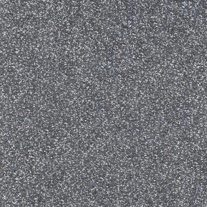 Close-up view of ECORE PlayGuard Rubber Tile - 2.5" Playground Flooring by ECORE Athletic, revealing its rough gray surface with light and dark specks that showcase the textured look of this durable playground flooring.