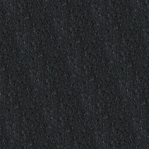 A close-up of ECORE Athletic's PlayGuard Rubber Tile - 2.5" Playground Flooring reveals its black, rough, textured, and slightly speckled rubber surface.