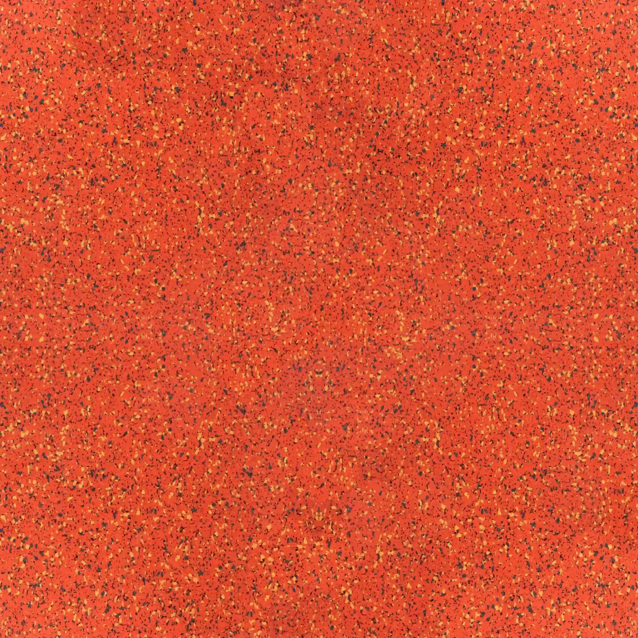 Close-up of ECORE PlayGuard Rubber Tile - 2.5" Playground Flooring by ECORE Athletic, featuring a vibrant red speckled texture with evenly scattered yellow, black, and orange dots for an abstract patterned background.