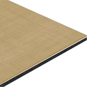 A close-up of ECORE Serenity Motivate Laminate Roll - 7mm Class 1 Flooring by ECORE Athletic shows its rectangular, multi-layered structure with a light tan top and dark gray core, highlighting the panel's thickness and layered build.
