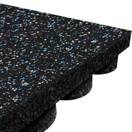 Close-up of the ECORE Athletic ECORE Performance UltraTile - 1" Rubber Tile in black with blue and white speckles. The underside has a textured, raised circular pattern for added cushioning and support.