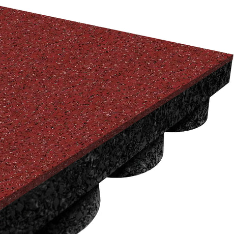 A close-up of the ECORE Athletic ECORE Performance UltraTile—1" rubber tile—shows its red speckled, textured surface and black, dimpled underside engineered for shock absorption.