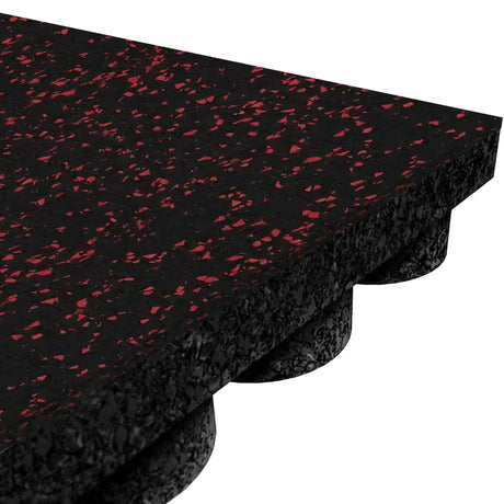 Close-up of the ECORE Athletic ECORE Performance UltraTile - 1" Rubber Tile: black with red flecks, textured surface, and an underside featuring evenly spaced circular protrusions for cushioning and stability.