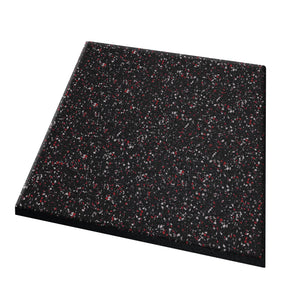 The ECORE Performance dBTile Rubber Tile - 2.5" Acoustic Flooring by ECORE Athletic is a square black tile with small red, white, and gray speckles, displayed on a white background.