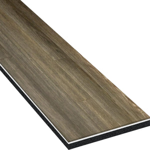 A close-up of ECORE Heritage Motivate Vinyl Plank - 7mm PVT Performance Flooring by ECORE Athletic, showing its textured brown wood-look surface and layered black and white cross-section.