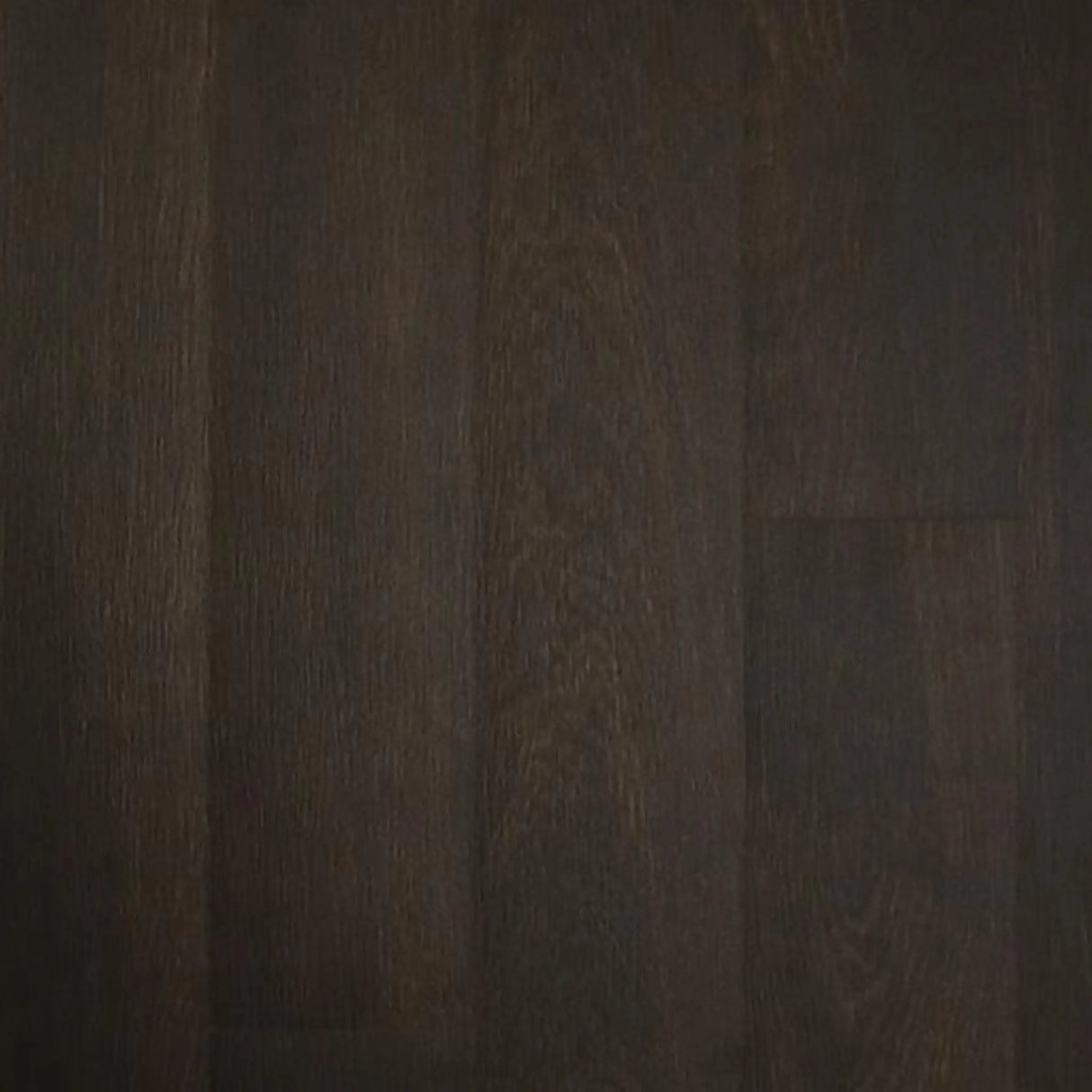 ECORE Heritage Motivate Vinyl Plank – 7mm PVT Performance Flooring by ECORE Athletic features a dark brown wood look with subtle grain patterns, matte finish, and closely fitted planks for a smooth, even surface.