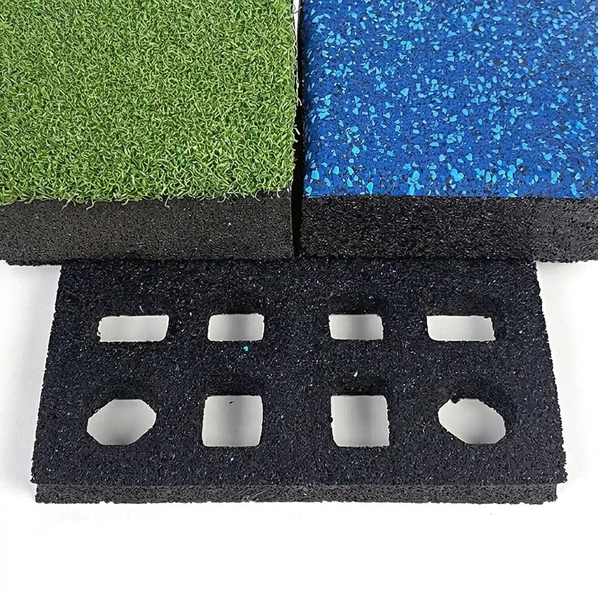 Close-up of ECORE Athletic Quad Blok Connector for 2.5" tiles: two rubber tiles (green and blue with speckles) rest above a black connector tile featuring multiple rectangular and octagonal cutouts, all with textured surfaces.