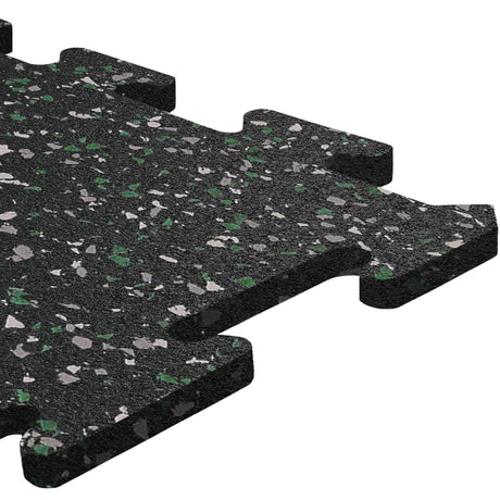 Close-up of an ECORE Athletic 8mm Rubber Floor Tile featuring black interlocking edges, gray and green speckles, and a textured surface.