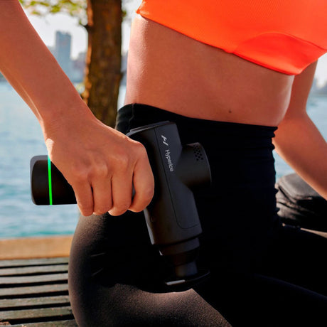 Percussion massage gun by Hyperice